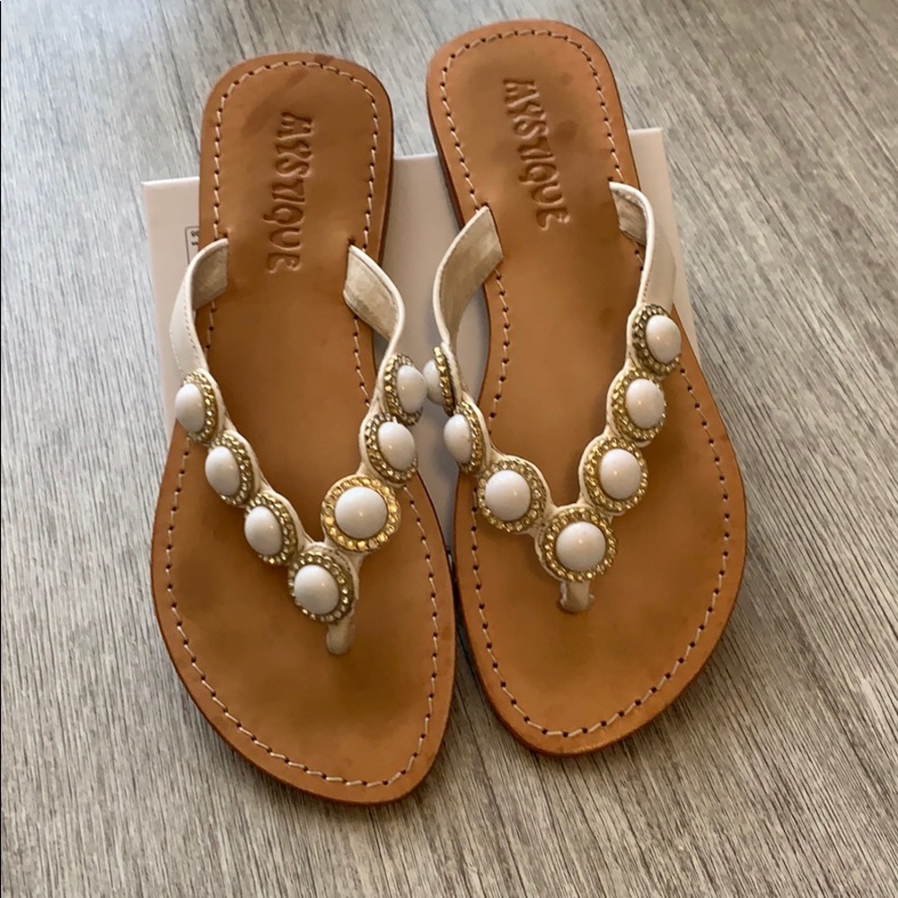 Mystique white jeweled and embellished flip flops